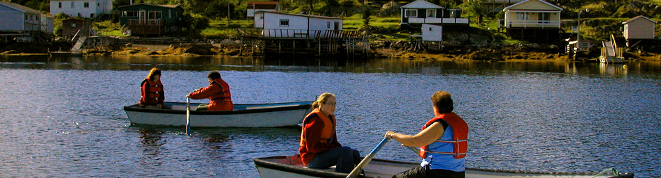 Paddling traditions row boats at Woody Island Resort